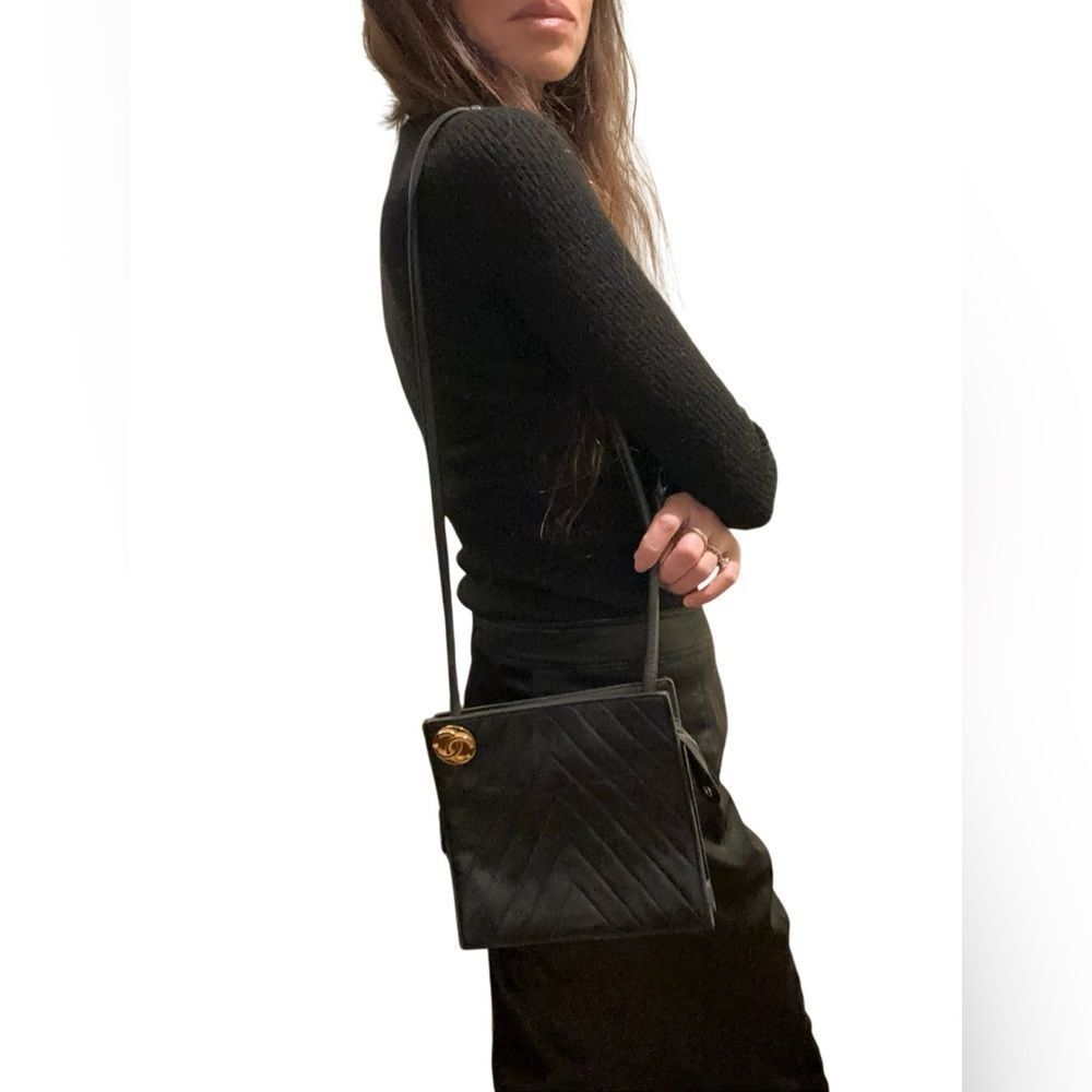 CHANEL Black Chevron Leather Shoulder Bag with Gold Accent
